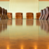 Empty boardroom table and chairs in a corporate office