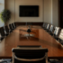Empty boardroom table and chairs in a corporate office